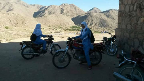 girls-riding-bike-to-school-in-jaghuri-hazarajat-500px